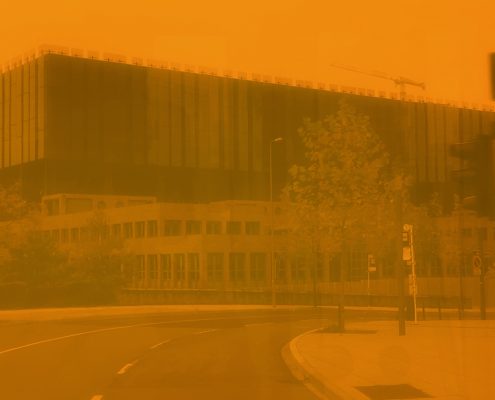 EU Building Through Tram Window